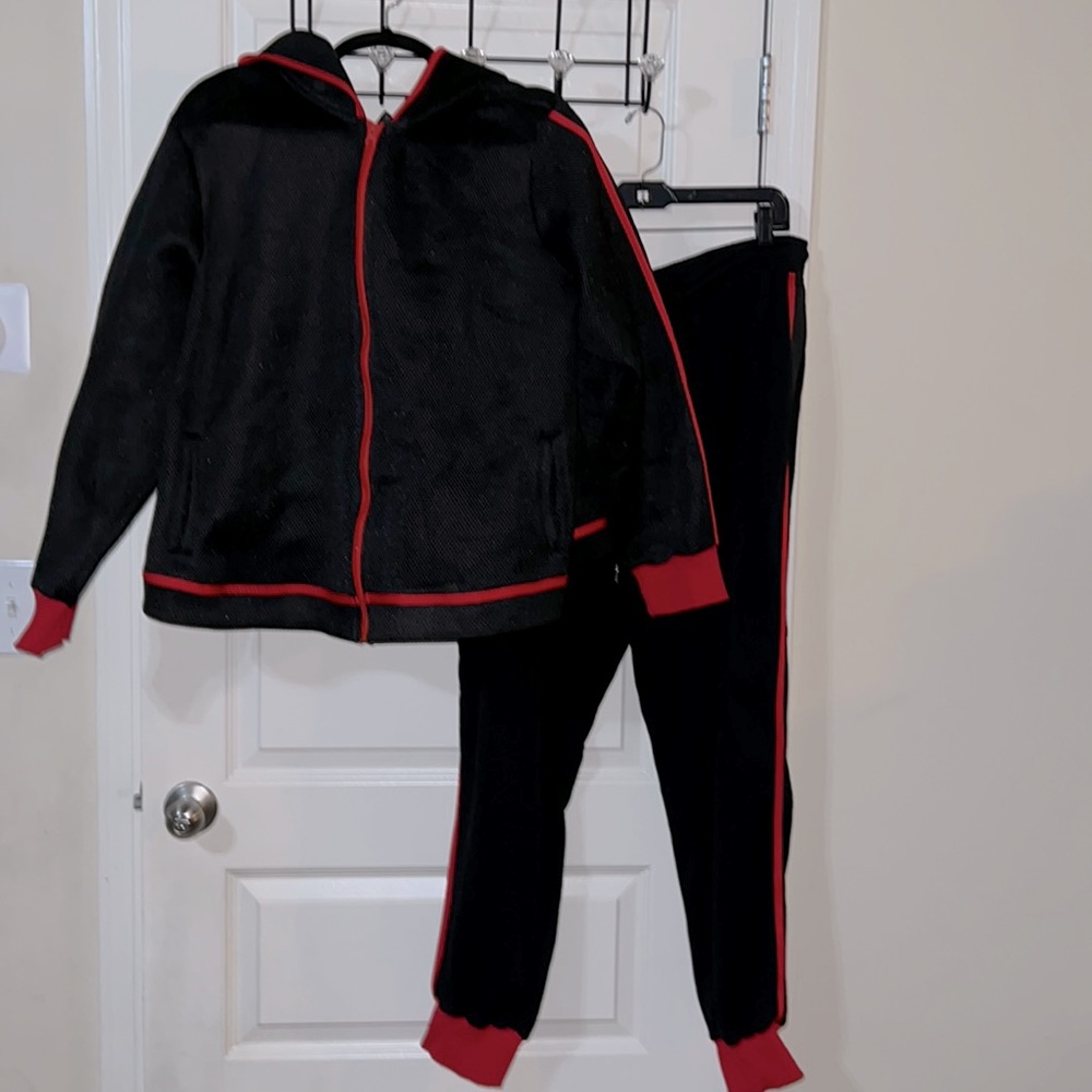 2pc jogger from Ashley Stewart. Mesh hooded jacket with banded ankle pant